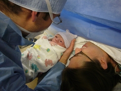 Samantha Sofia with her elated mother and father